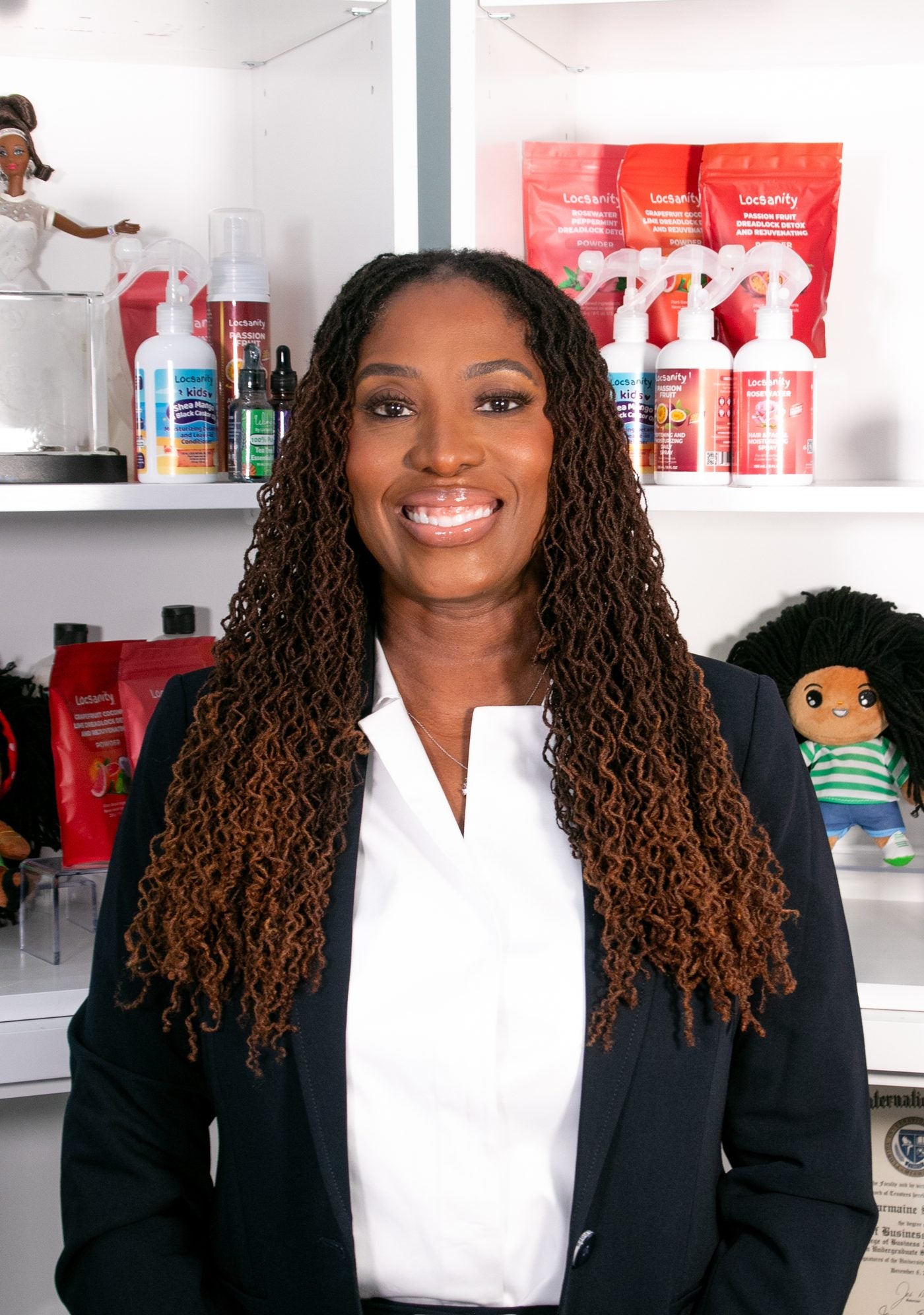 Charmaine James with Locsanity products